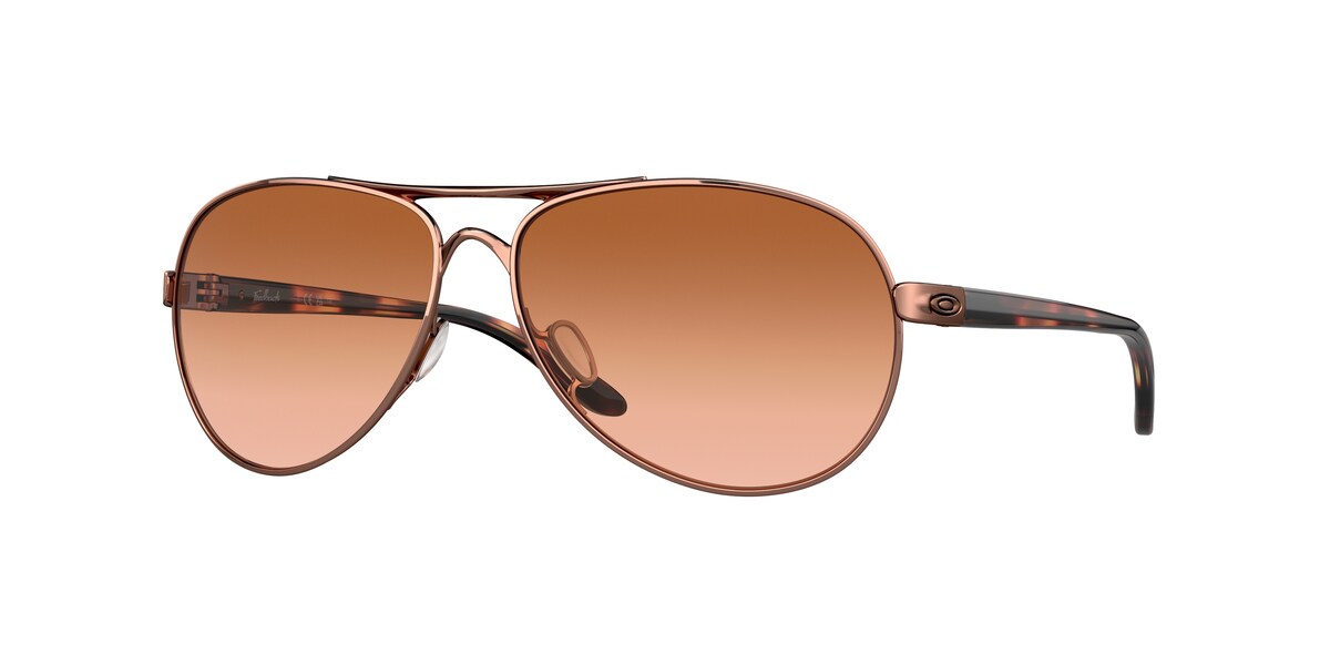 แว่นกันแดด OAKLEY OO4079 สี Rose Gold / Vr50 Brown Gradient (407901) ที่ร้านแว่น GIFTGREATS