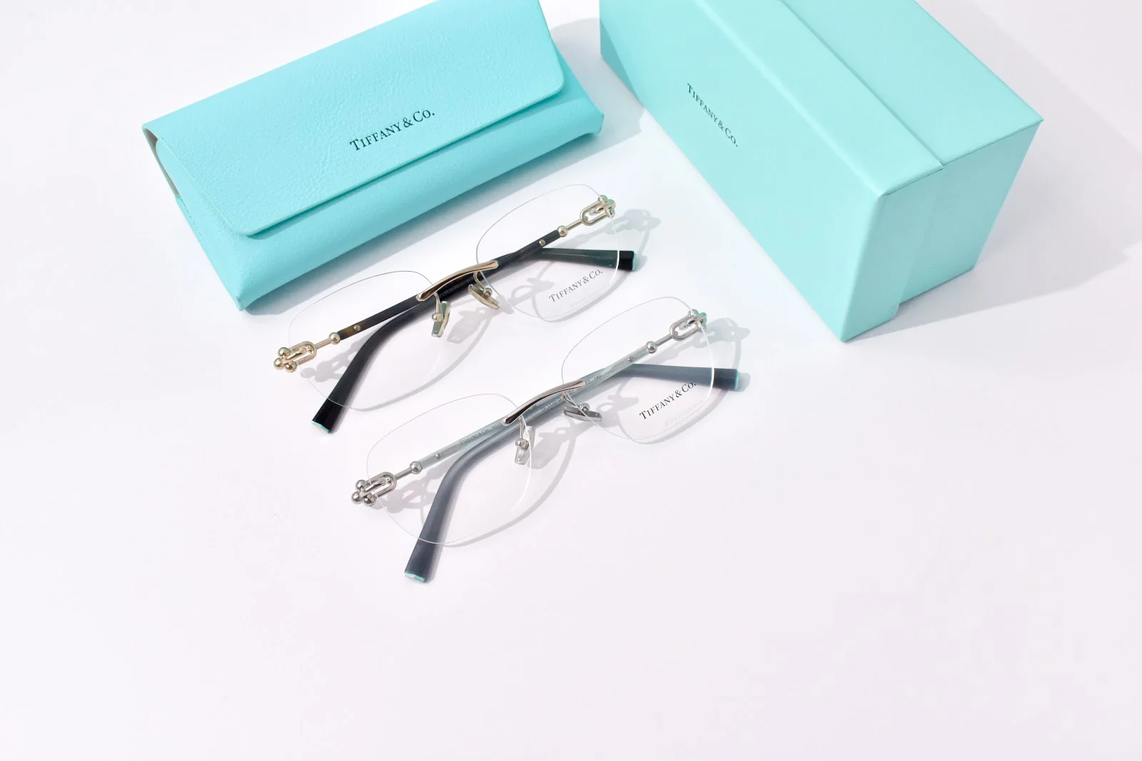 กรอบแว่นสายตา Tiffany & Co. TF1170D แบบไร้ขอบ ขาสีดำ บานพับโลหะ