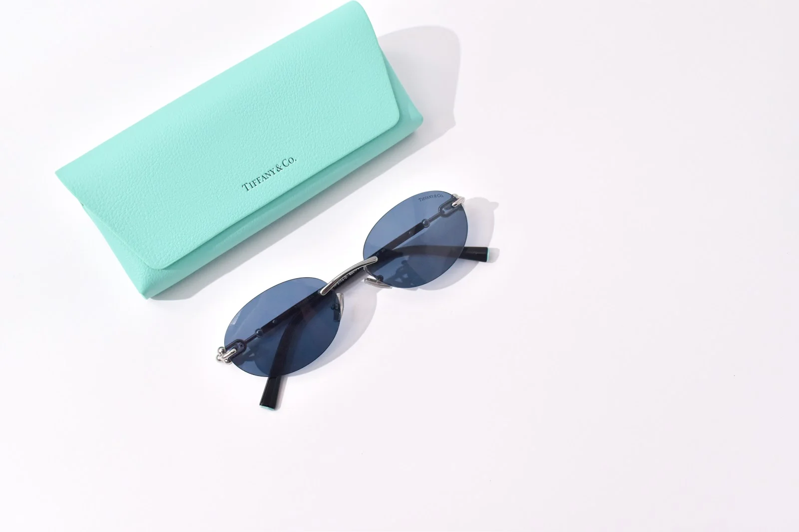 แว่นกันแดด Tiffany & Co. TF3104D ไร้ขอบ เลนส์สีน้ำเงินเขียวเข้ม